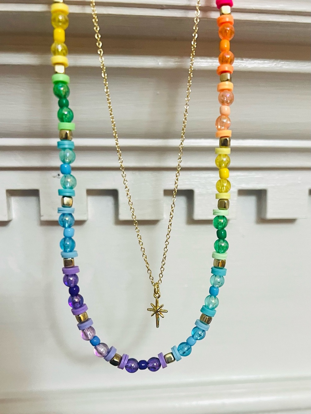 Layered Gold North Star Pendant Necklace with Multicolor Beaded Accent
